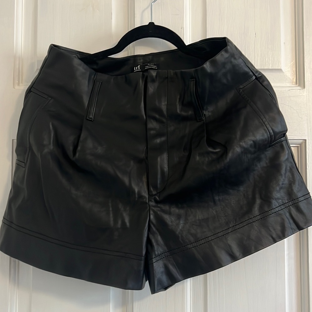 Black leather trousers/shorts